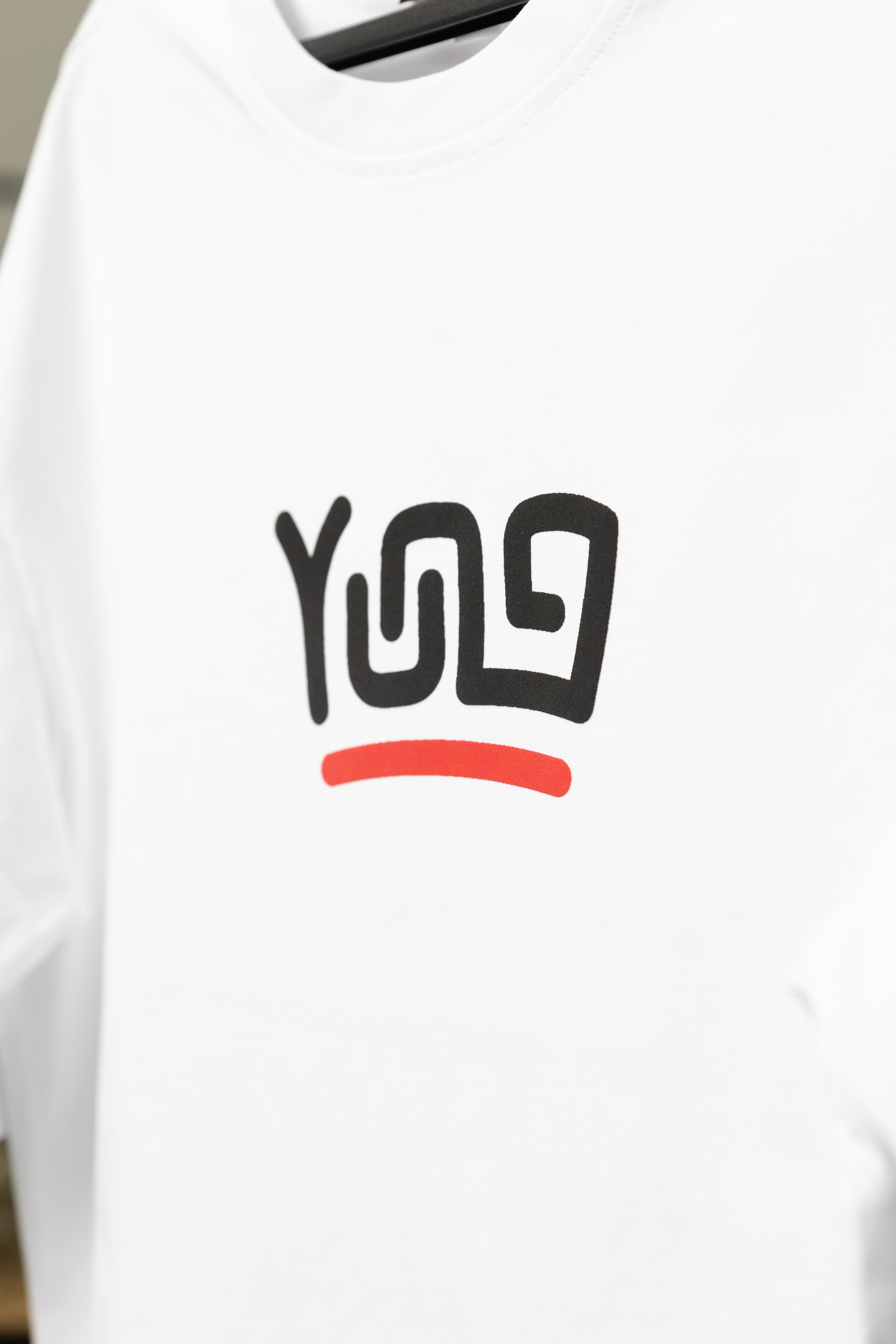 White sweatshirt with black and red graphic design on a white background
South Africa
