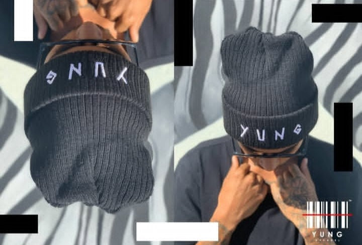 Person wearing a YUNG black knit beanie with 'YUNG' branding, shown from multiple angles.
South Africa