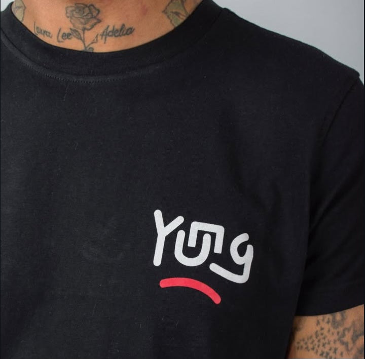 Black t-shirt with 'Yung' logo on a person wearing tattoos.
Streetwear South Africa