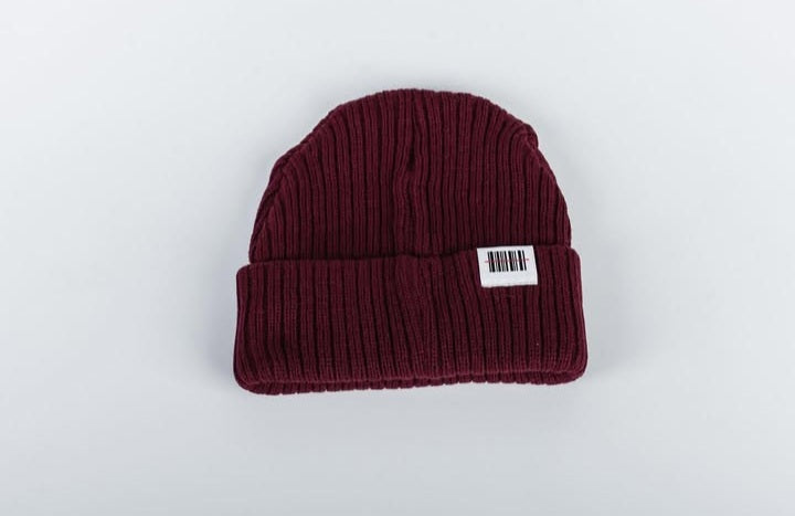 Barcode Maroon beanie with a label on a white background
South African streetwear