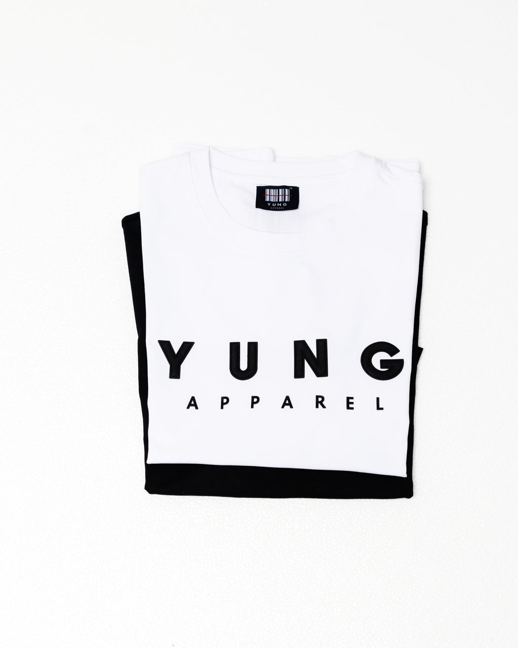 White crop top with black trim and 'YUNG APPAREL' logo on a white 
background
Streetwear South Africa