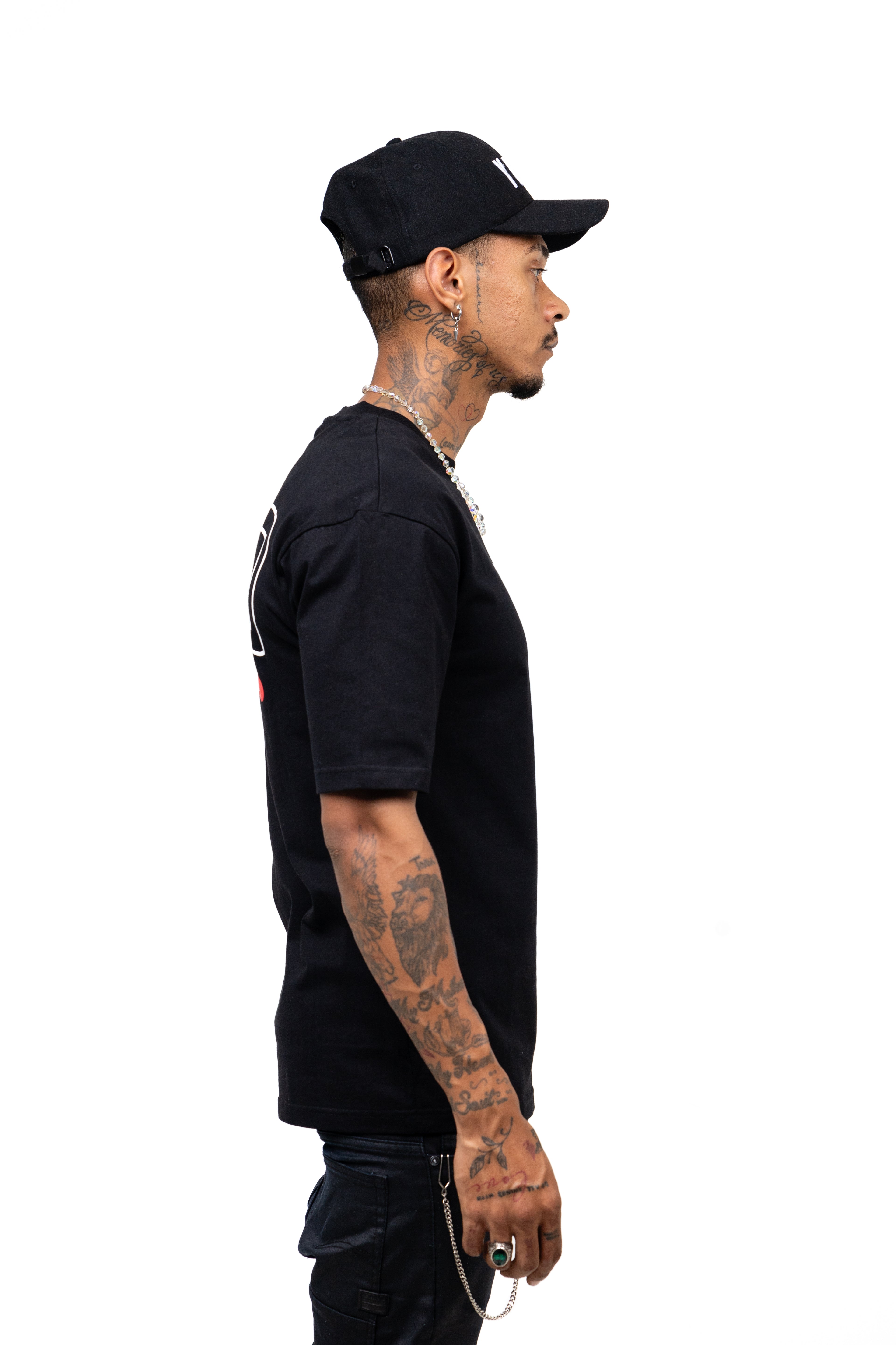 Man wearing a Y U N G black t-shirt and cap on a white background
Streetwear South Africa