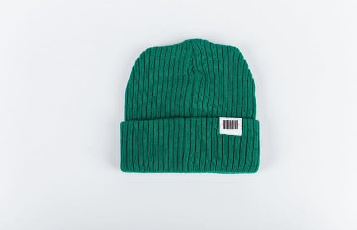 Green beanie with a label on a white background
South AFrican Streetwear