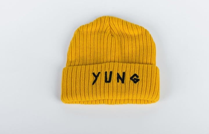 YUNG Mustard beanie with 'YUNG' text on a white background
South African Streetwear